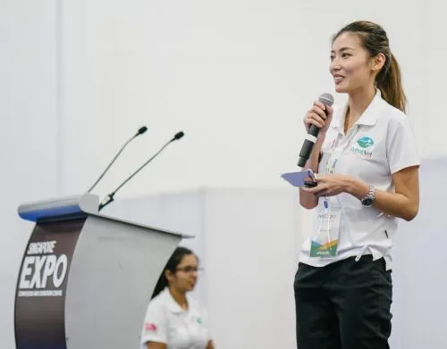 Sara Lam giving a speech at the Pet Expo in Singapore on Animal Rehabilitation